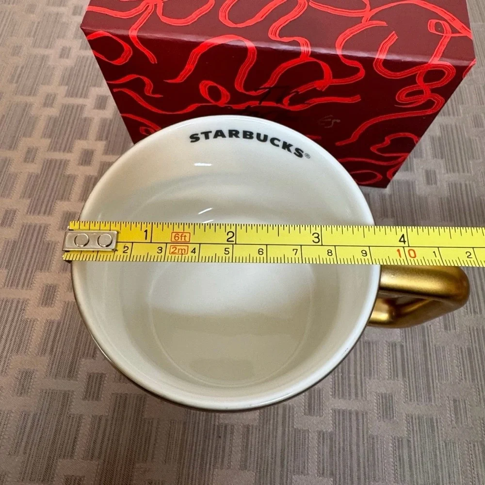 Starbucks 2025 Limited Edition Gold Poinsettia Mug. New in Box